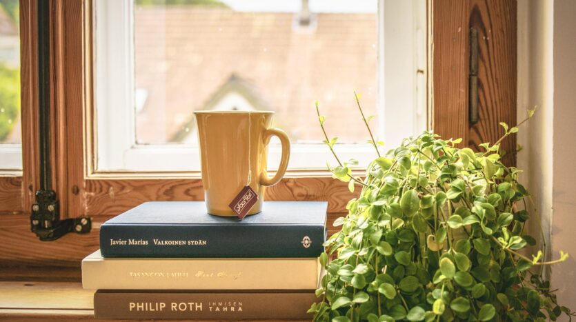 book stack books contemporary cup