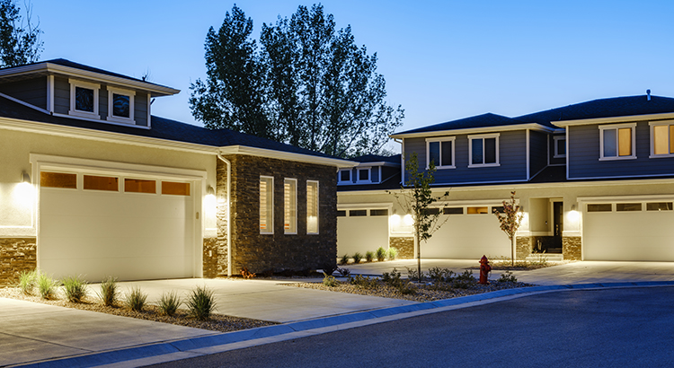 A suburban USA neighborhood at dusk.