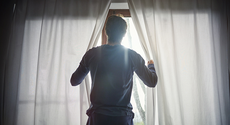 Man getting up in the morning