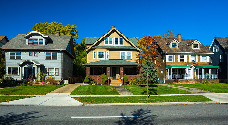 Three houses in a Cleveland, Ohio neighborhood.