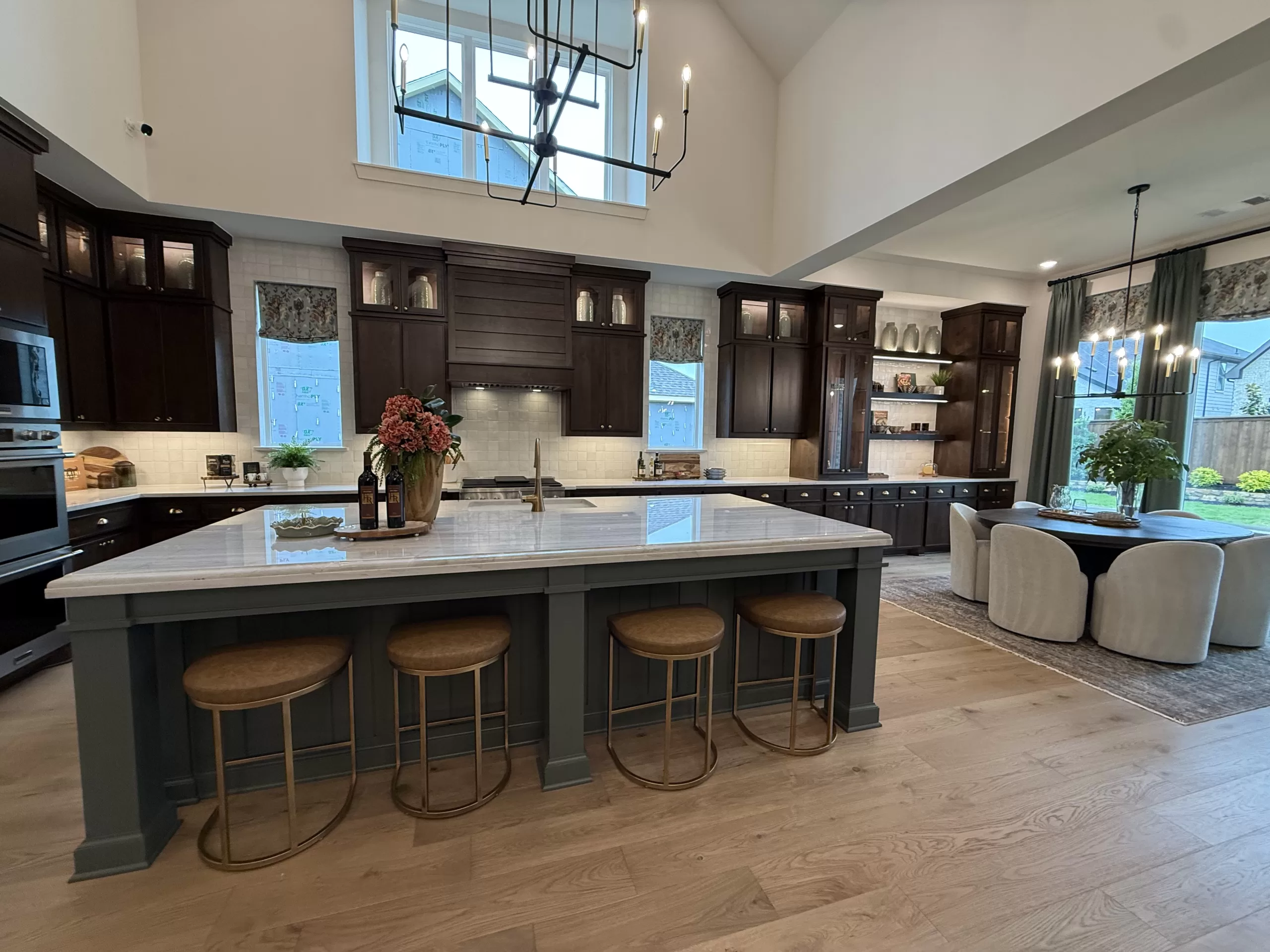 Highland Homes Furst Ranch Flower Mound TX model home exterior with stone, brick, and modern farmhouse architecture.
